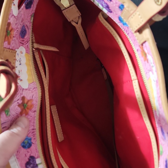 Dooney and Bourke cupcake pursebarely used. No stains or tears. Cupcake. Pink - Picture 2 of 10